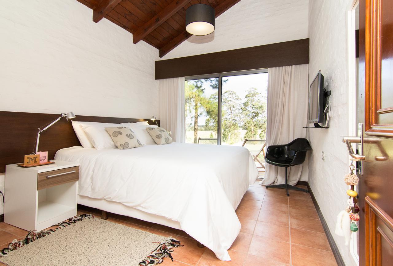 Posada Mosaico Villas Garzon Oda fotoğraf